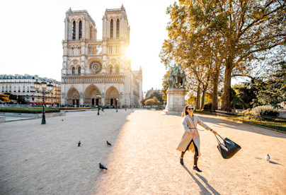 woman-on-th-esquare-near-notre-dame-cathedral-in-p-2025-03-16-05-24-56-utc