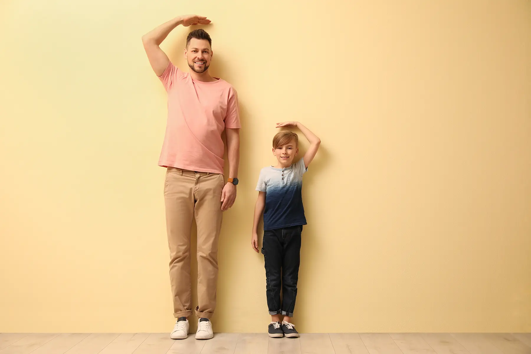 A man and a bot measuring their height