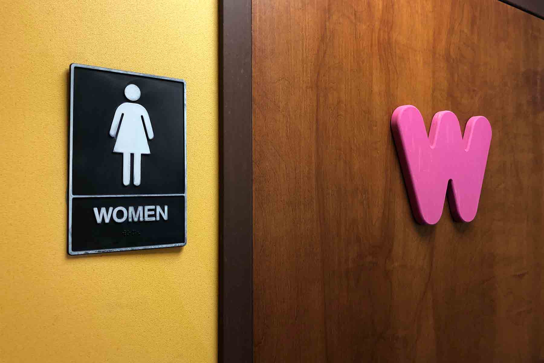 A women's bathroom sign