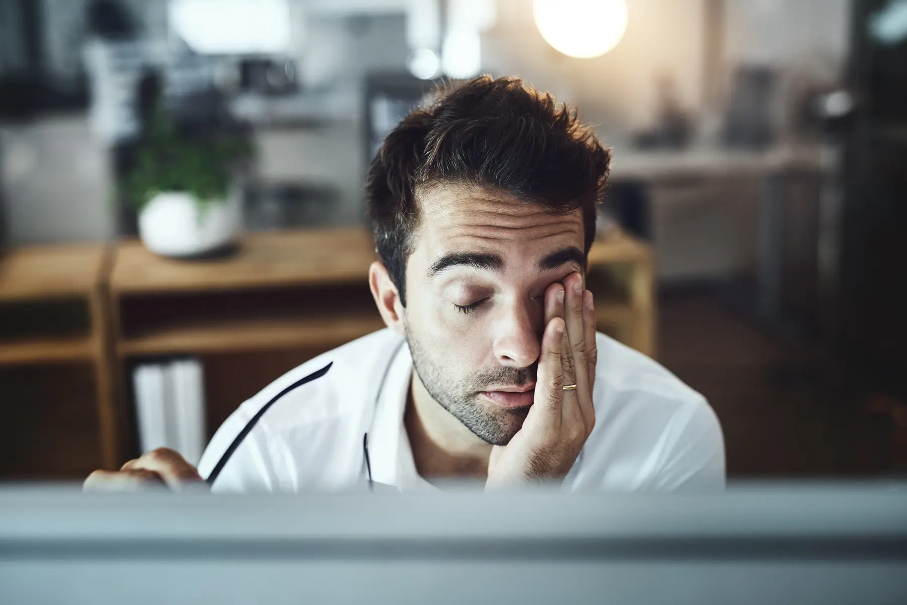 Man looking sad/stressed out.