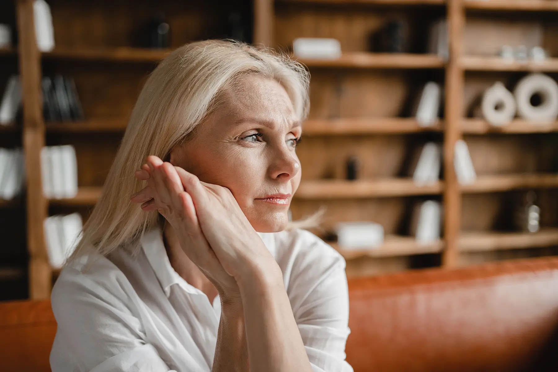 Woman in midlife looking sad