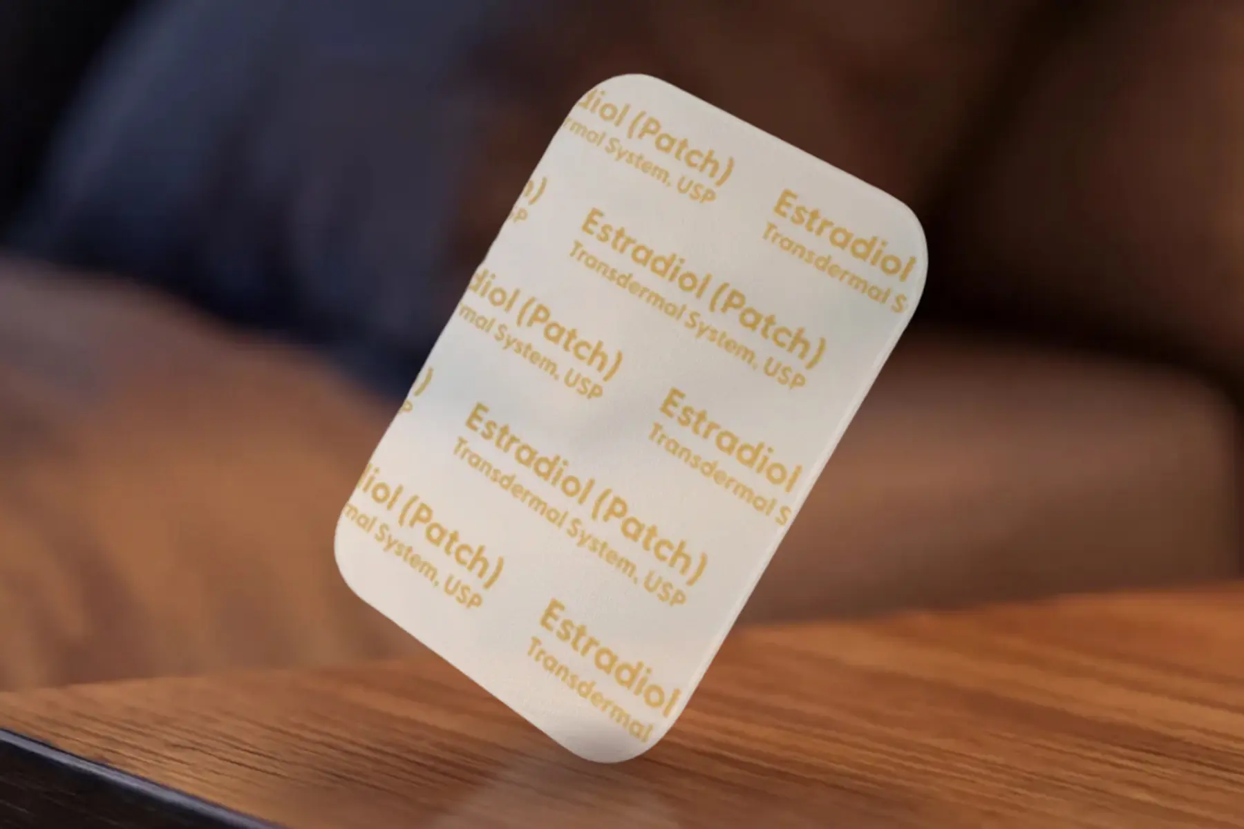 Estrogen patch on a wooden table