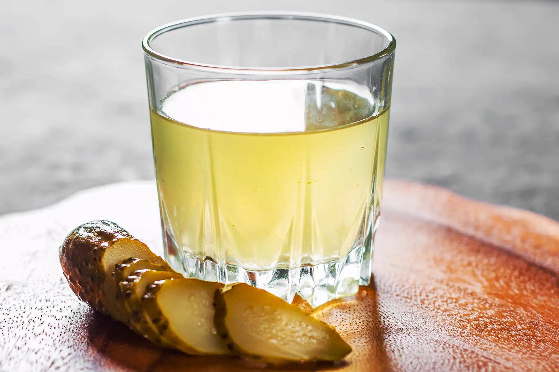 A glass of pickle juice