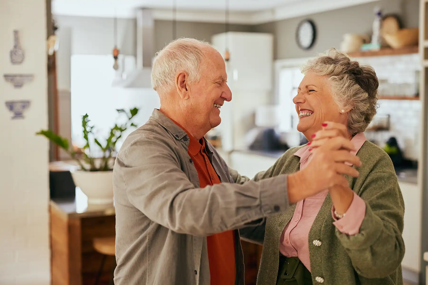 Old couple dancing together