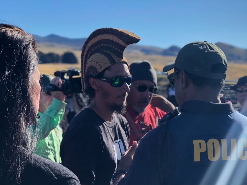 Kaho'okahi Kanuha Talking To Police - During the anti-TMT protests, Kaho'okahi Kanuha represents Hawaiians seeking to protect the mountain from further desecration. Here he is talking to local police to help keep everything peaceful.