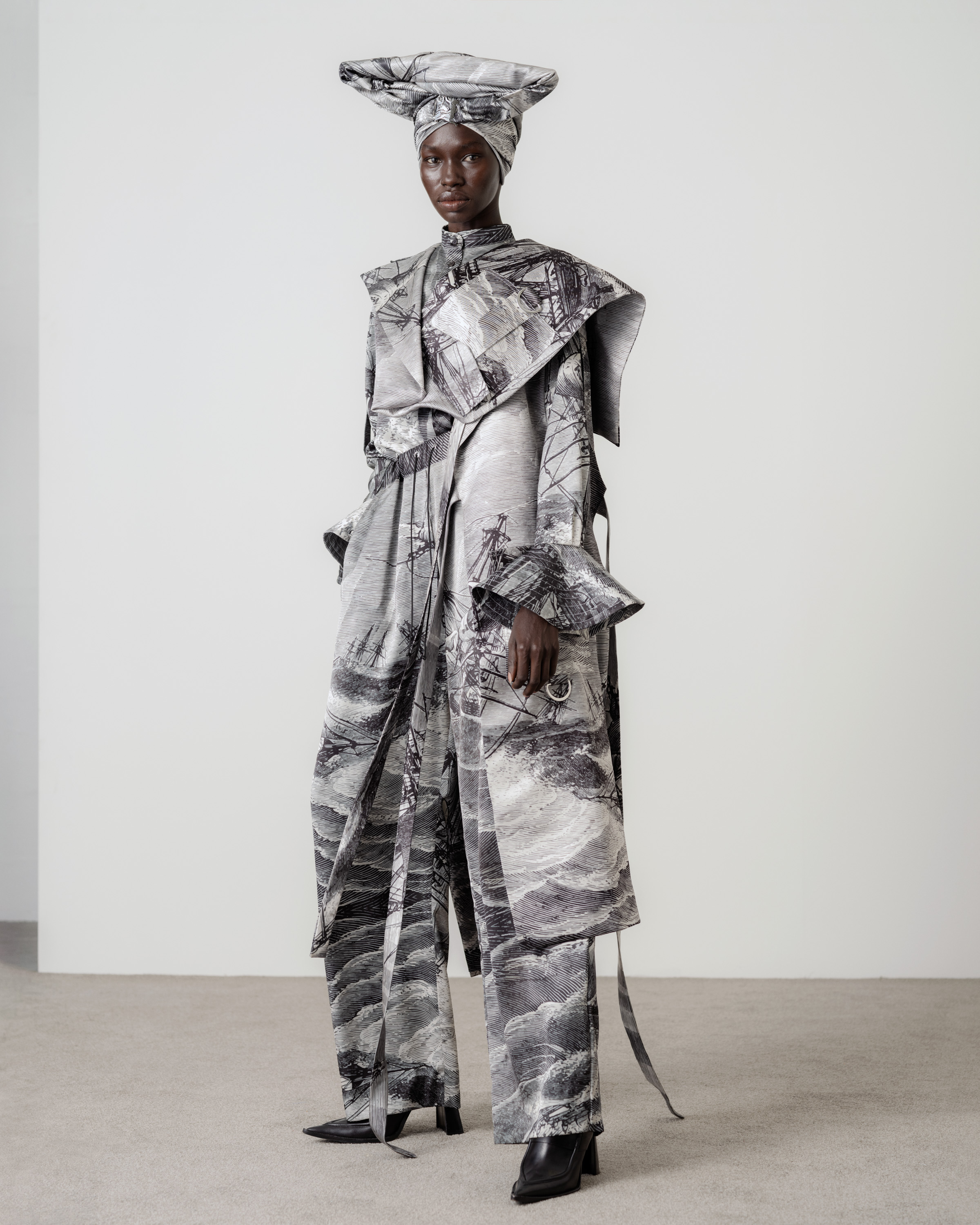 AW 23 — THEBE MAGUGU