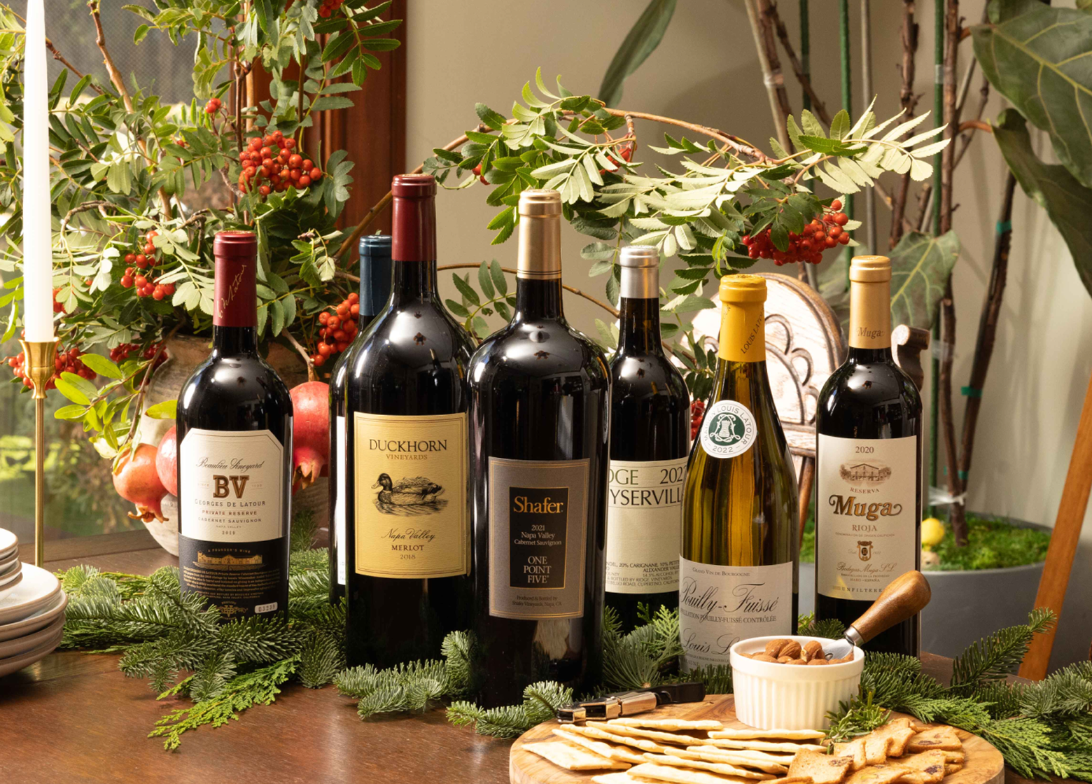 image of bottles surrounded by holiday decorations