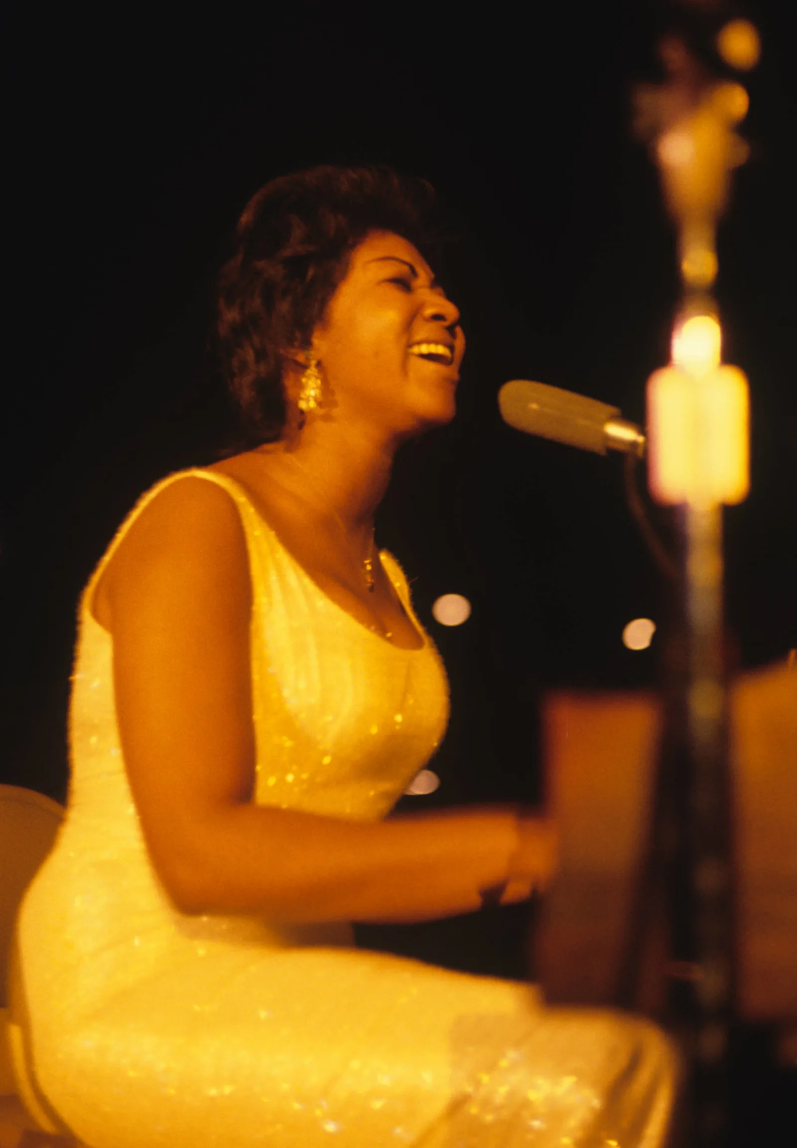 1960 - A young singer named Aretha Franklin, then 18, gets her start performing professionally at the Playboy Club in Chicago which is established with a clear stance on segregation: Performers and patrons, black or white, would be welcome through the venue’s main entrance. This was in contrast to having them enter through the kitchen, a common practice at the time. When Playboy learns that the Club franchises in New Orleans and Miami were refusing to admit blacks, they buy back the operating licenses for those clubs. “We are outspoken foes of segregation,” Playboy writes. “We are actively involved in the fight to see the end of all racial inequalities in our time. Other notable Playboy Club performers: Sonny & Cher, Tina Turner, Sammy Davis Jr. Lilly Tomlin, Bette Midler, Richard Pryor, George Carlin, Joan Rivers, Eartha Kitt, Ray Charles and more. (Image: Aretha Franklin by Walt Burton.)
