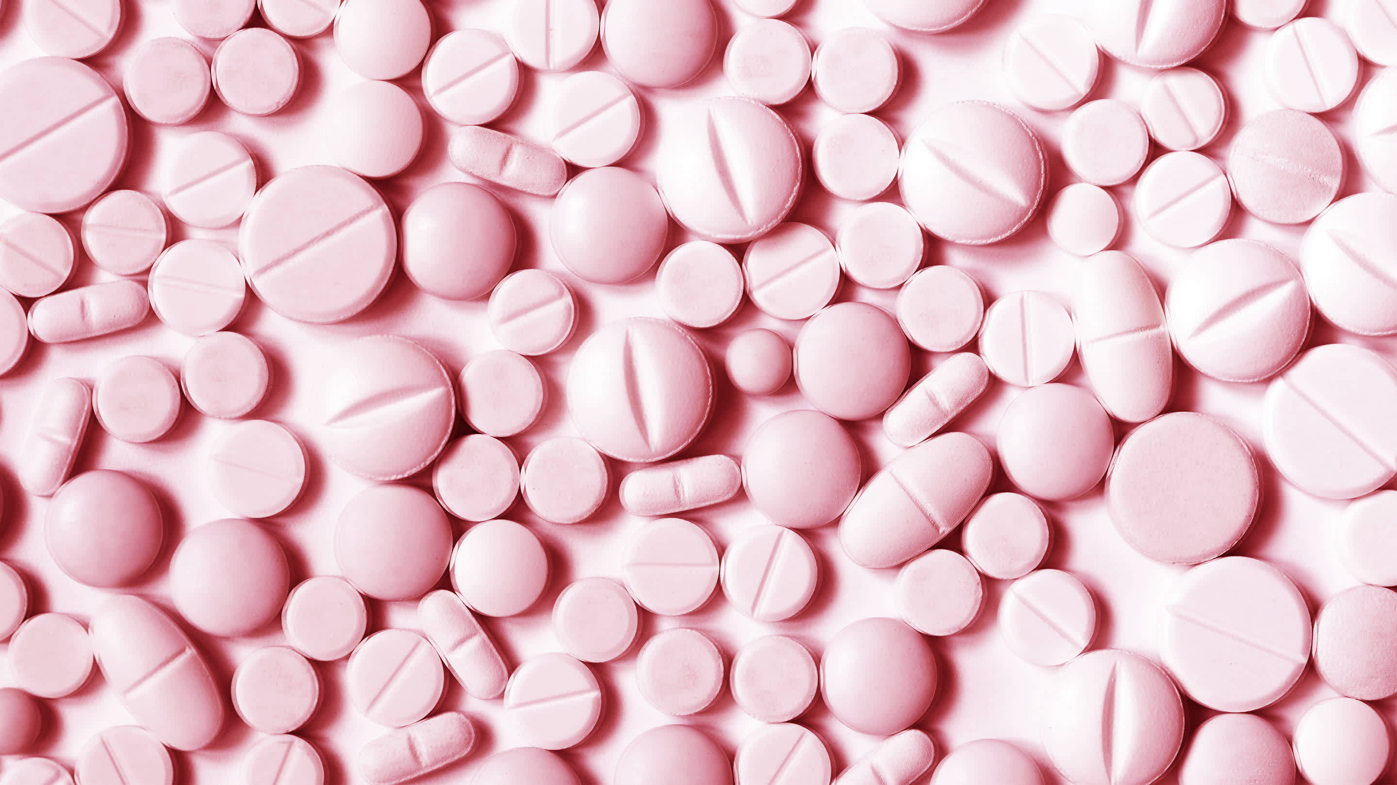 Розовая упаковка таблетки. Ксанакс фон. Ксанакс розовые таблетки. Таблетки фон. Таблетки на розовом фоне.