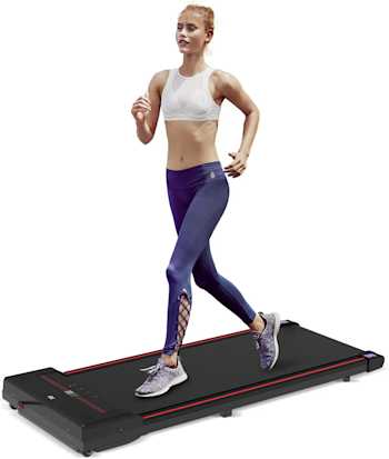 An image of a woman running on a walking pad