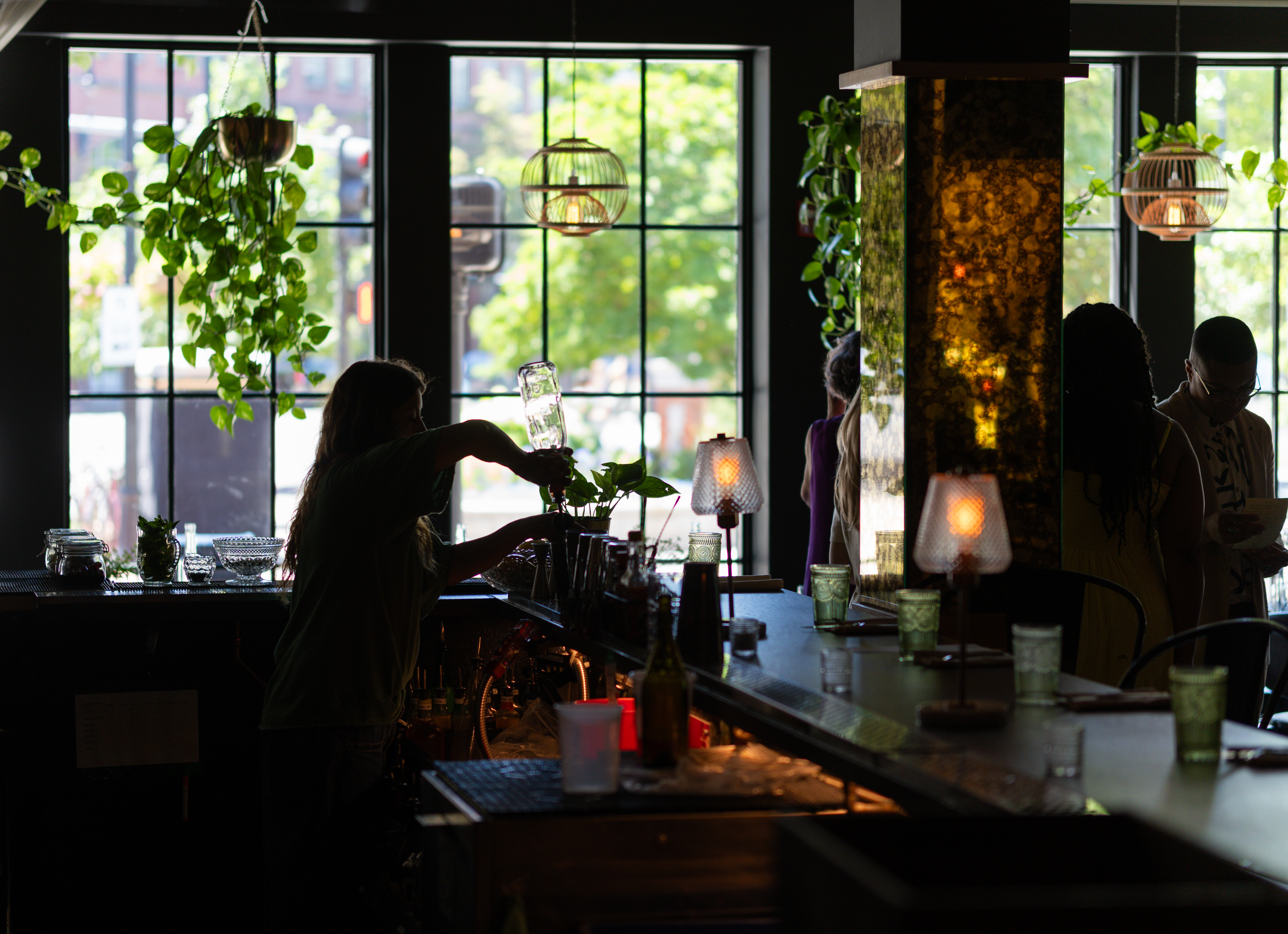Althea Bartender Pouring Drink