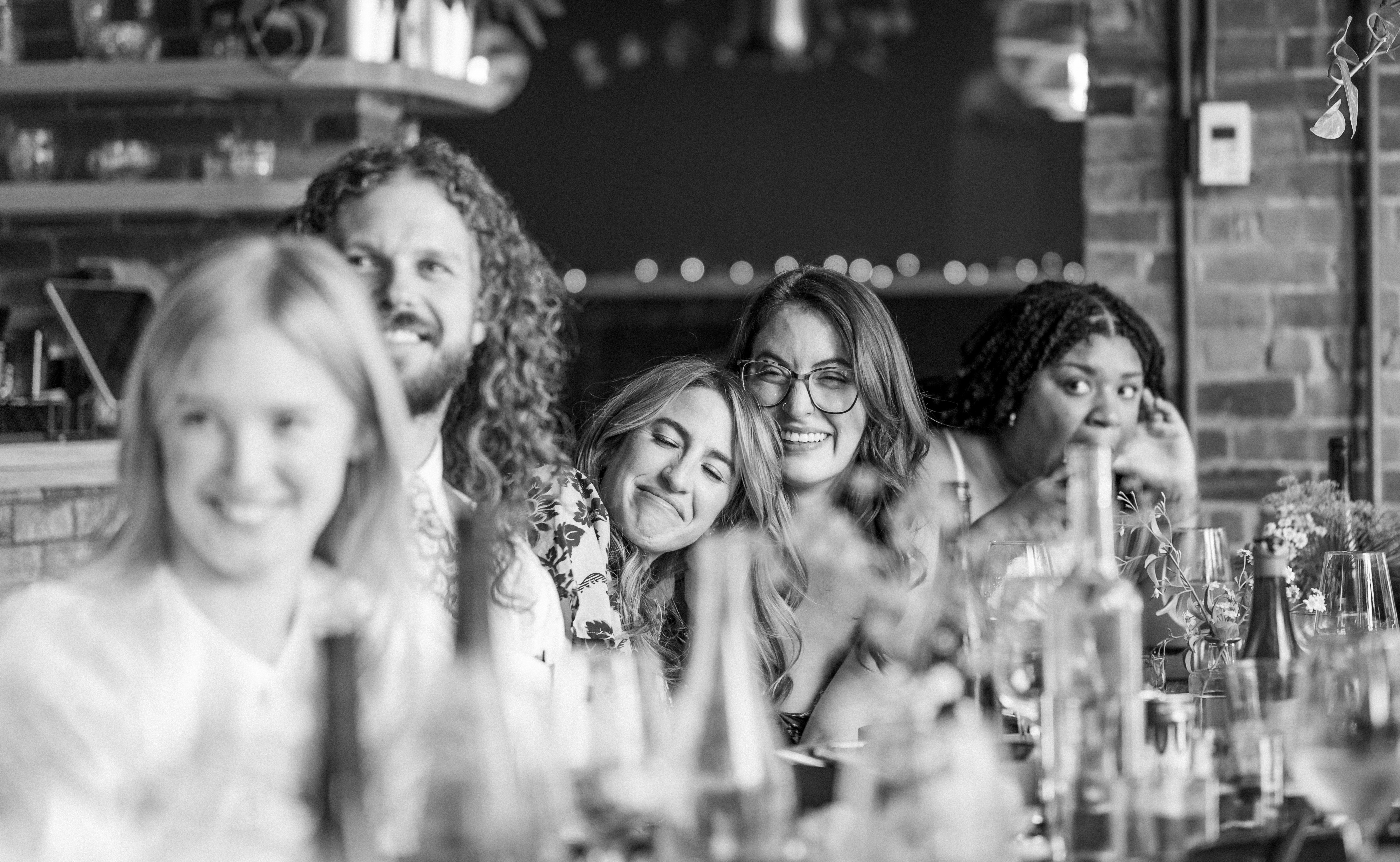 Two women crying during a wedding toast at Althea, Cambridge Massachusetts.