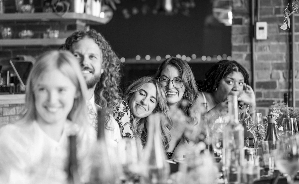 Two women crying during a wedding toast at Althea, Cambridge Massachusetts.