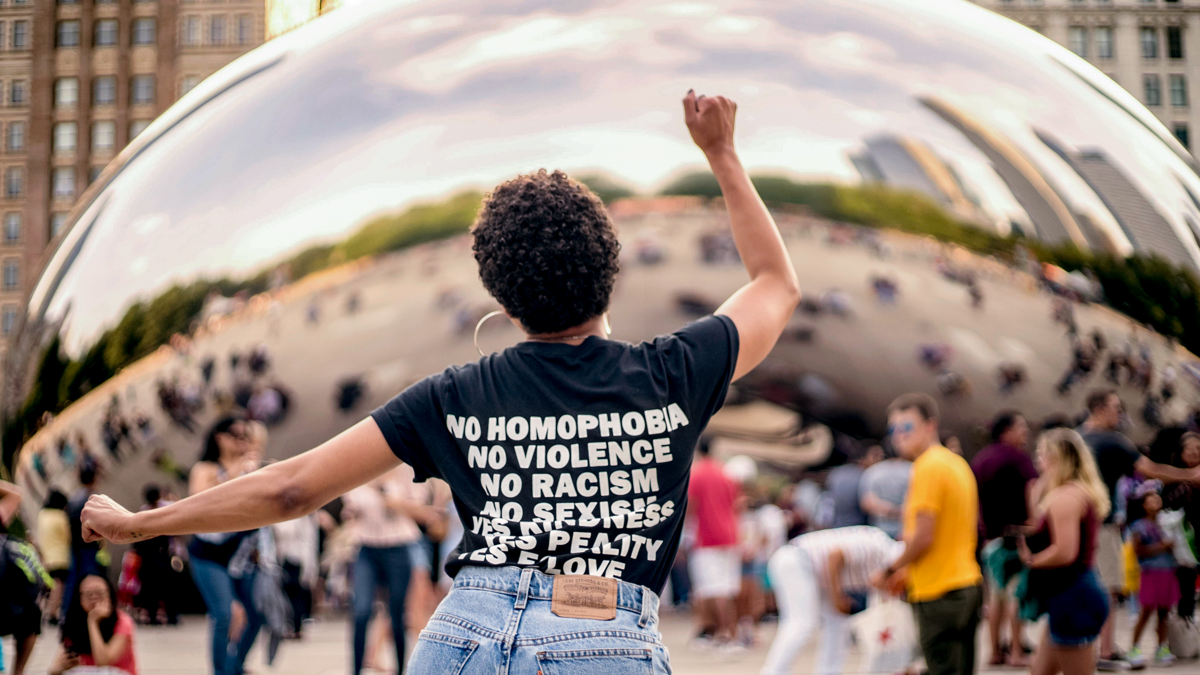 Black woman at Cloud Gate in Chicago with Equality text on back for t-shirt 