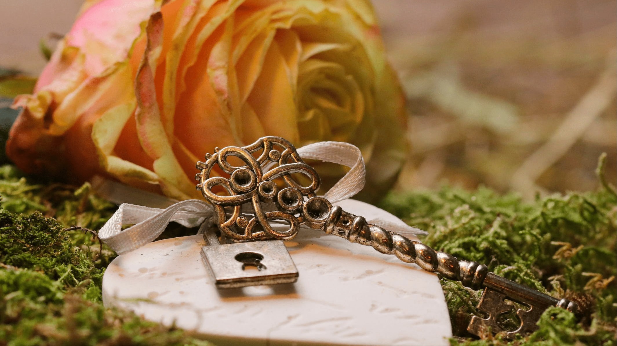 Vintage key with a lock and a rose