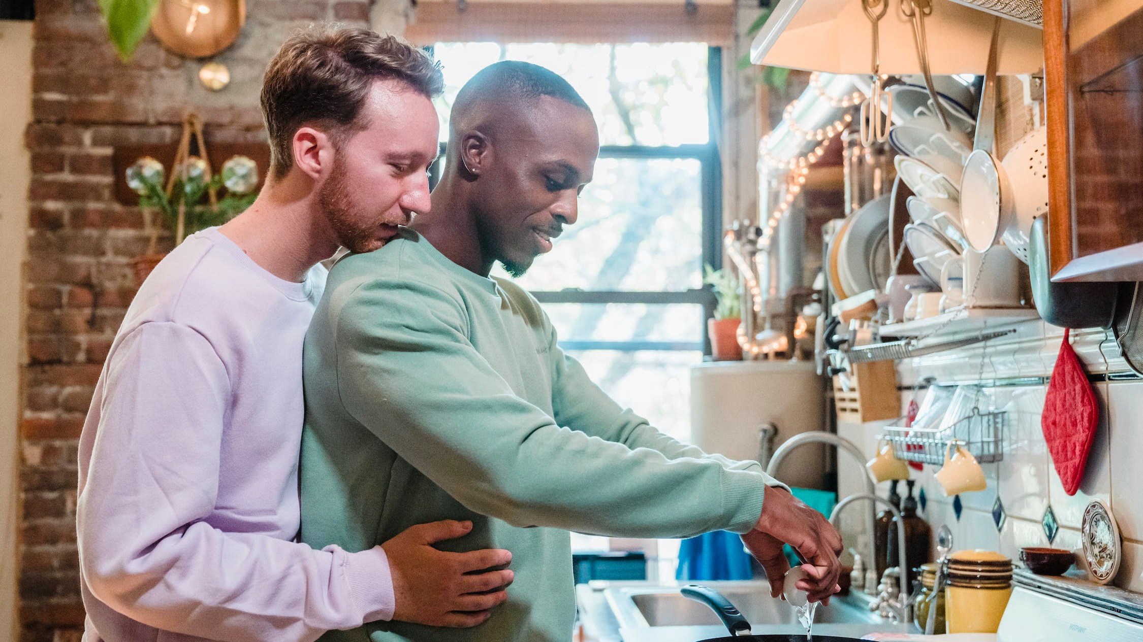 A couple cooking in the kitchen