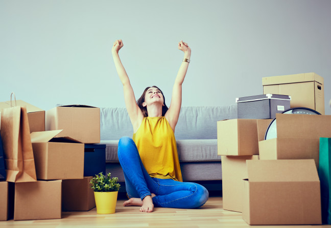 Women in house unpacking