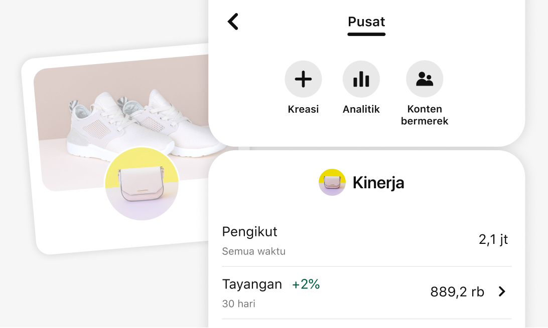 Cuplikan layar ponsel Pusat Kreator Pinterest dengan opsi untuk Kreasi, Analitik, dan Konten Bermerek. Bagian Performa menampilkan metrik untuk pengikut dan tayangan. Di belakangnya ada profil merchant yang memperlihatkan sepasang sepatu kets putih.