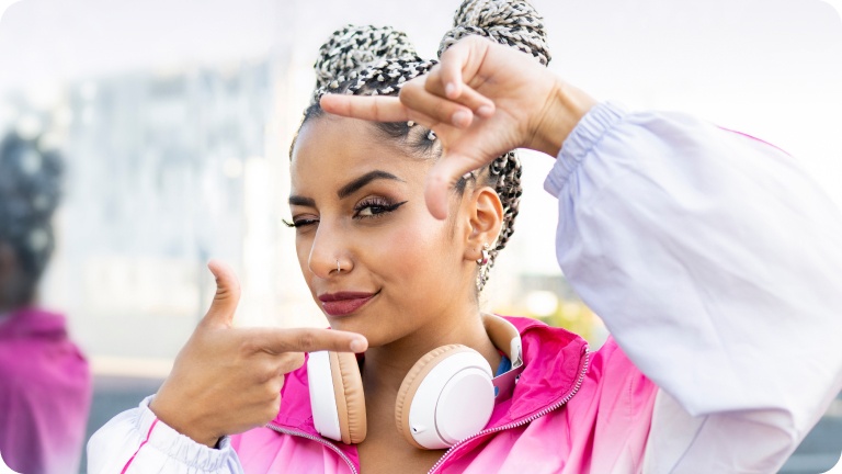 A woman making a frame with her fingers