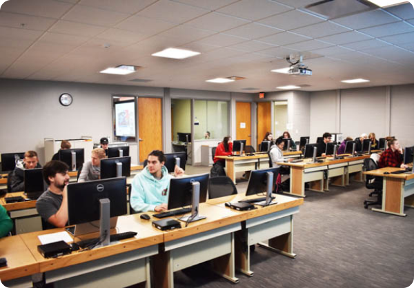 Students sitting at computers in a lab