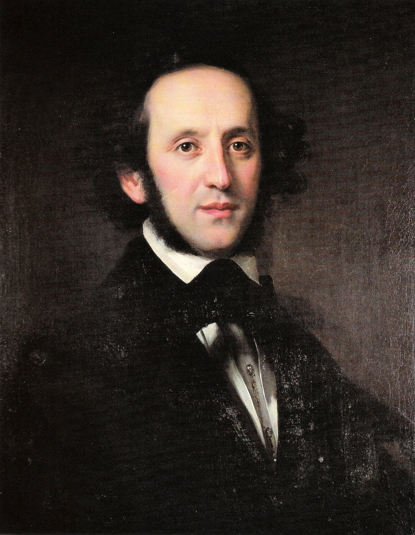 Felix Mendelssohn-Bartholdy, mit Backenbart und Lockenpracht, blickt uns entgegen