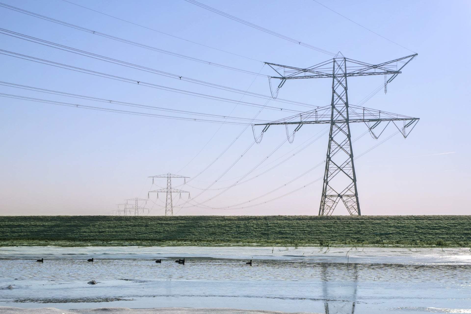 Electricity pylon near river