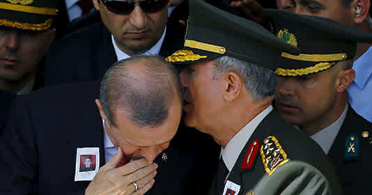 Erdogan whispers with General Hulusyi Akar