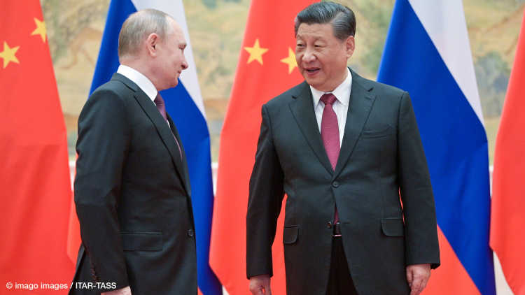 Russia's President Vladimir Putin and his Chinese counterpart Xi Jinping pose during a meeting at the Diaoyutai State Guesthouse.