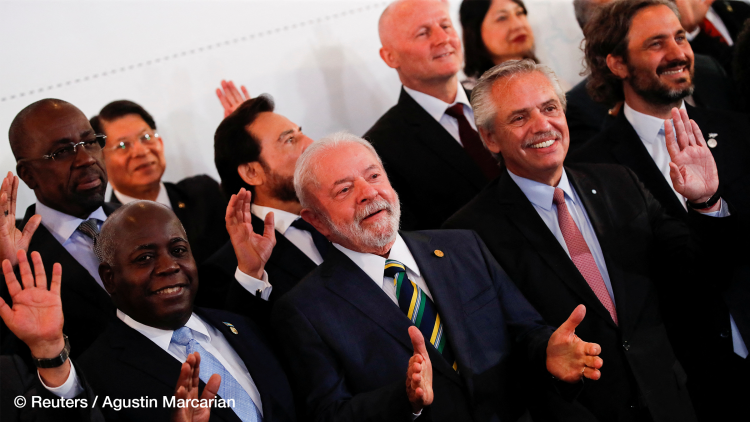 Brazil’s President Lula da Silva, Argentina’s President Fernandez and Bahamas’s Prime Minister Philip Edward Davis stand for a family photo during the 7th Heads of State and Government Summit of the Community of Latin American and Caribbean States (CELAC)