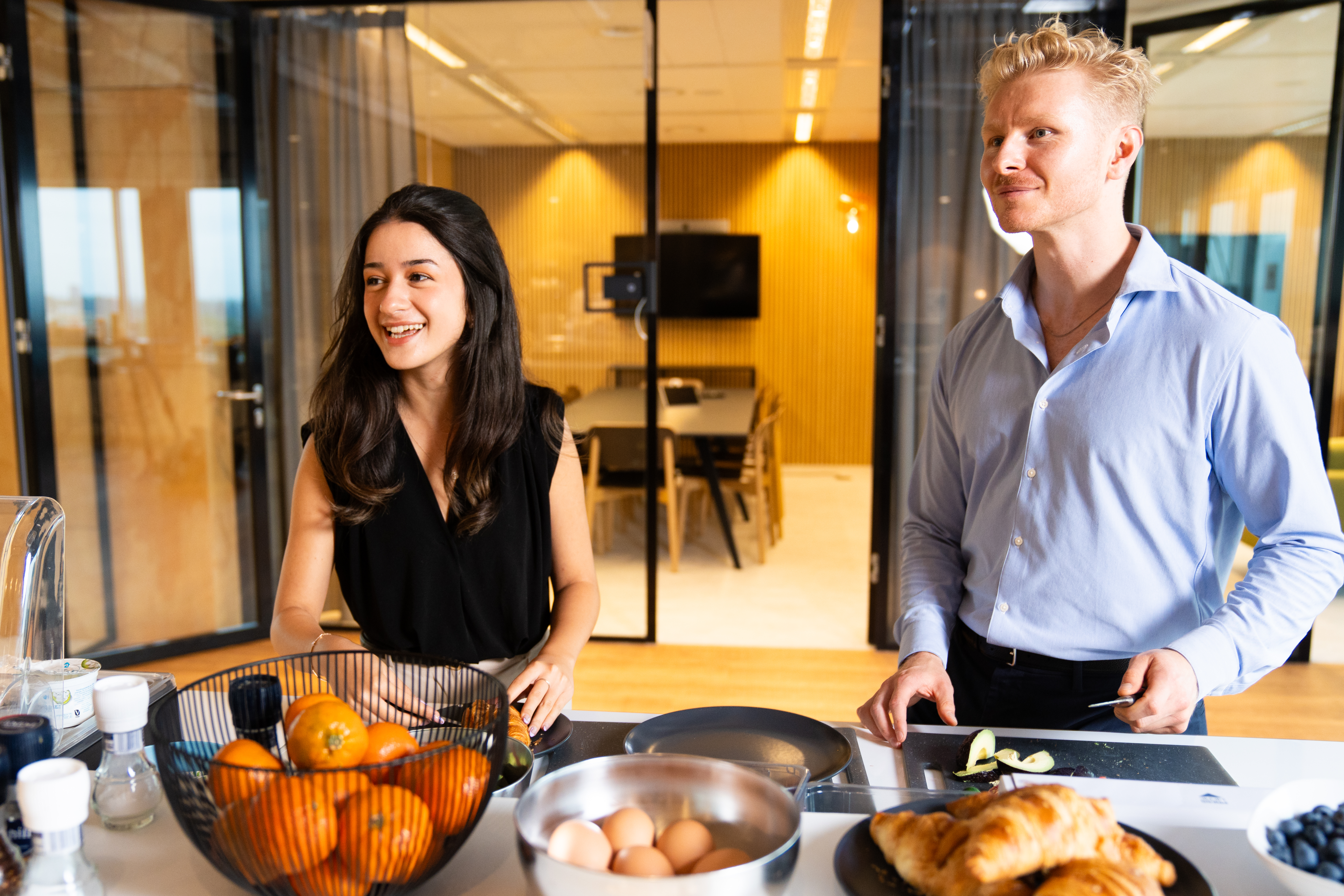 Two employees having breakfast