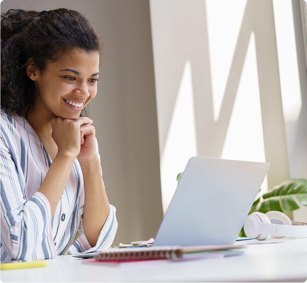 woman looking at a laptop