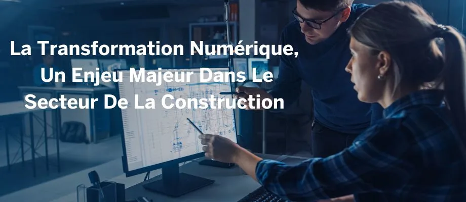 Two construction professionals collaborate on a blueprint displayed on a computer screen, illustrating digital transformation in the industry.
