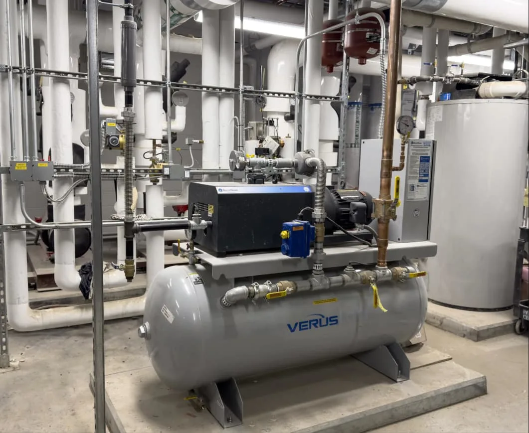 Domestic PRV station and compressor in the second floor mechanical room of the addition space