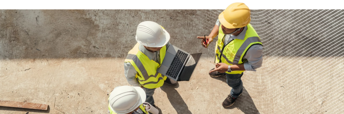 City skyline at dusk with technology overlay including a bulleted list of building regulations in the UK