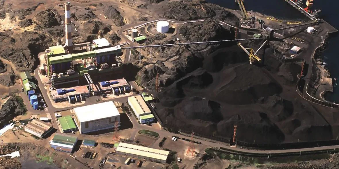 Aerial view of the Huasco coal power plant and its coal storage yard.