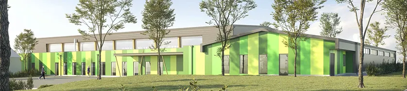 A modern gymnasium with a facade featuring vertical stripes in varying shades of green.