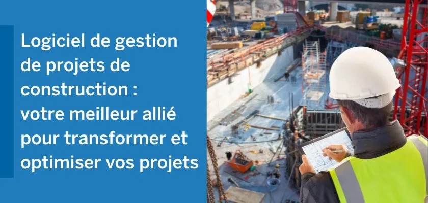 A construction manager in a hard hat and safety vest reviews plans on a tablet at a large construction site.
