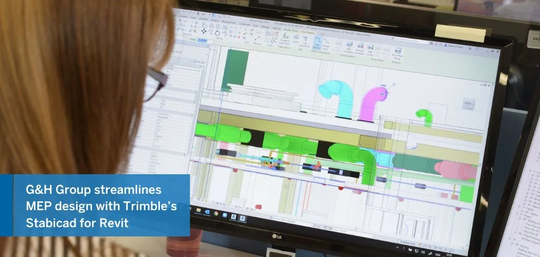 A person designs MEP systems on a computer using Trimble's Stabicad for Revit software.