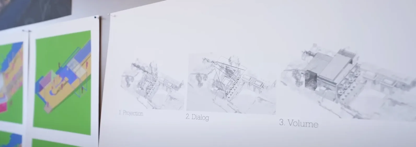 images hanging on a wall depicting a reimagining of a design for The Great Library, Library of Celsus