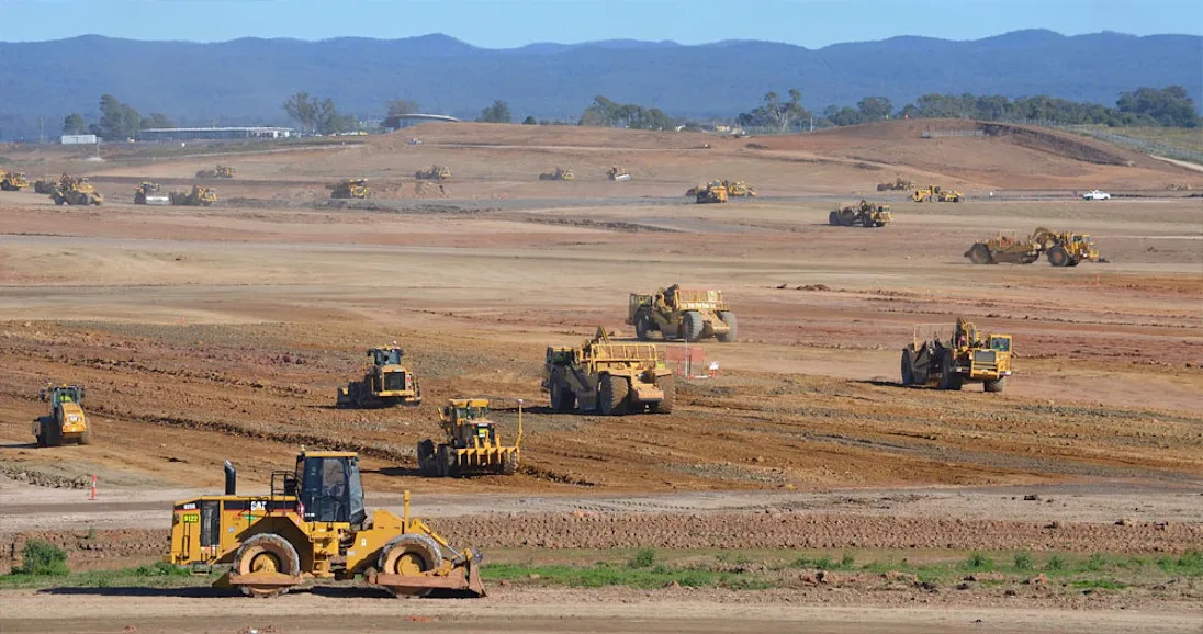 Multiple machines working on earthmoving project