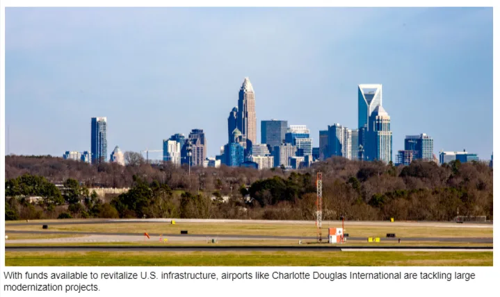 Charlotte Douglas International Airport skyline, with runway in the foreground.