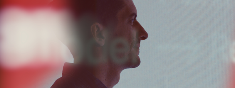 Sideview of Nick Mason headshot.