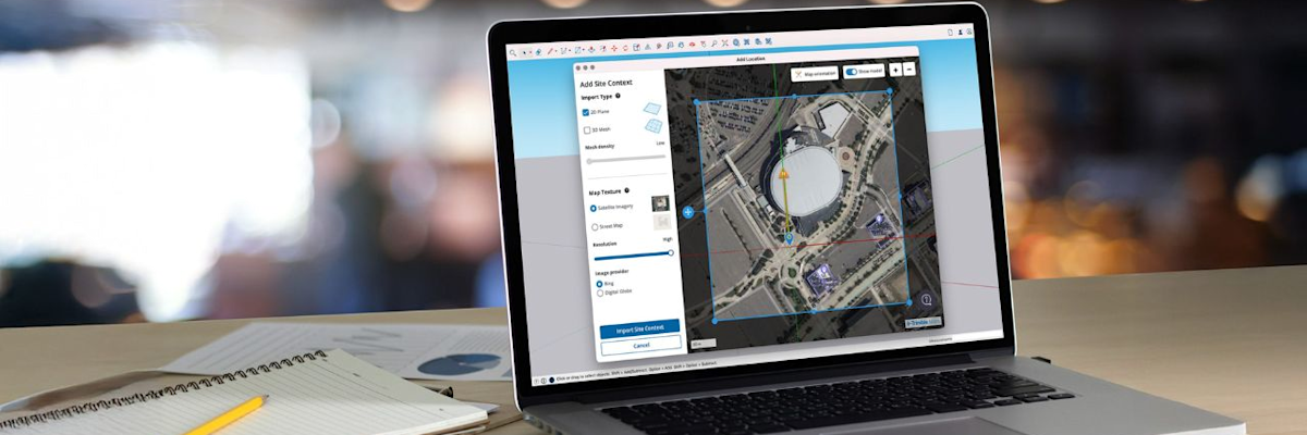 A laptop on a desk displays a satellite map with SketchUp drawing and editing tools on the screen.