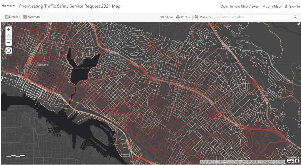 Map showing traffic safety prioritization in Oakland, CA, with streets color-coded by safety score.