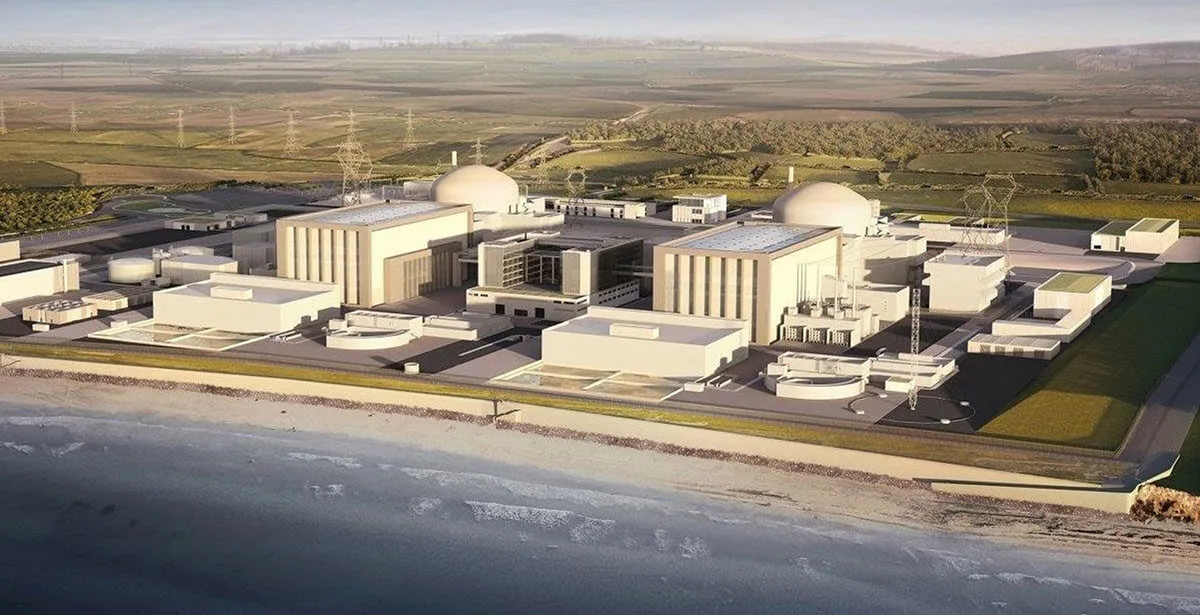 Rendering of a nuclear power plant on a coastline.
