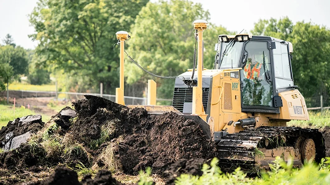 A dozer uses Trimble tech to begin the earthmoving process, as operators work confidently from the latest designs.