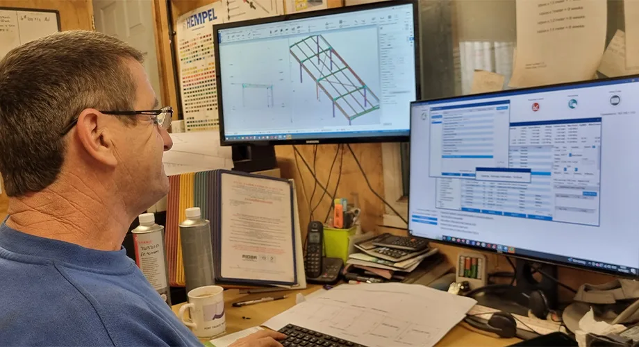 Man using Tekla PowerFab on a computer