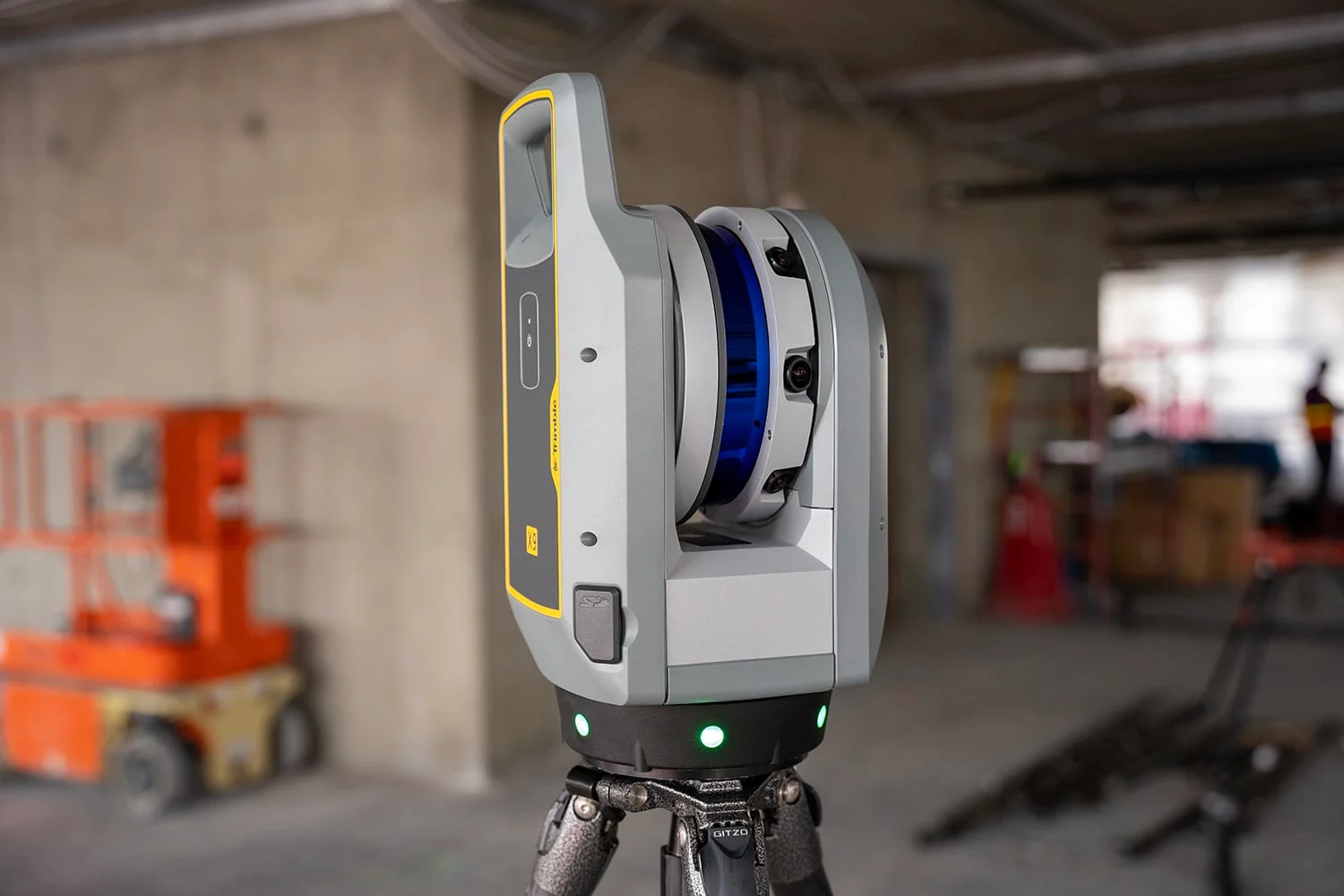3D laser scanner on a tripod on a construction site.