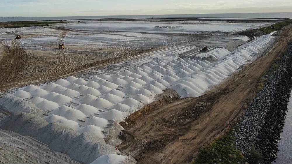Rock wall and material to create new land