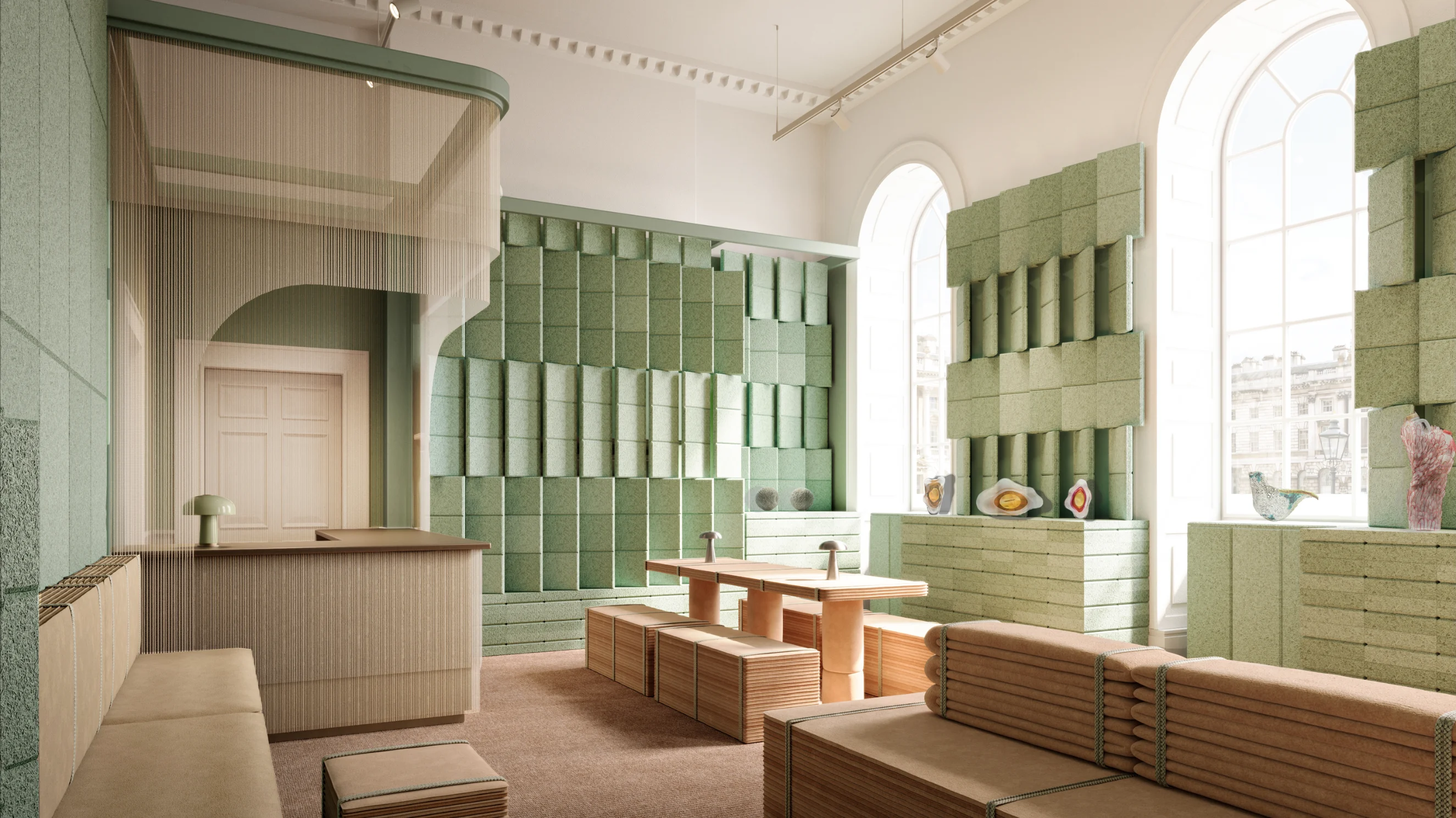 Render shows wooden tables and seating and green shelving with art pieces displayed on them.